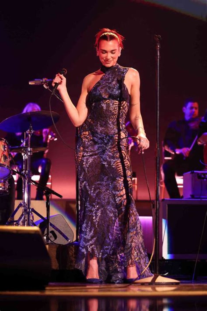 Dua Lipa in Sheer Black Outfit Says “Keep it Movinnnnn” — Celebwell