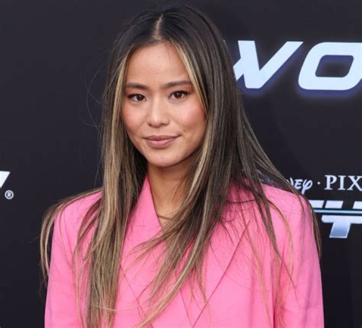 Jamie Chung in Bathing Suit "Touched Down in Aruba" — Celebwell