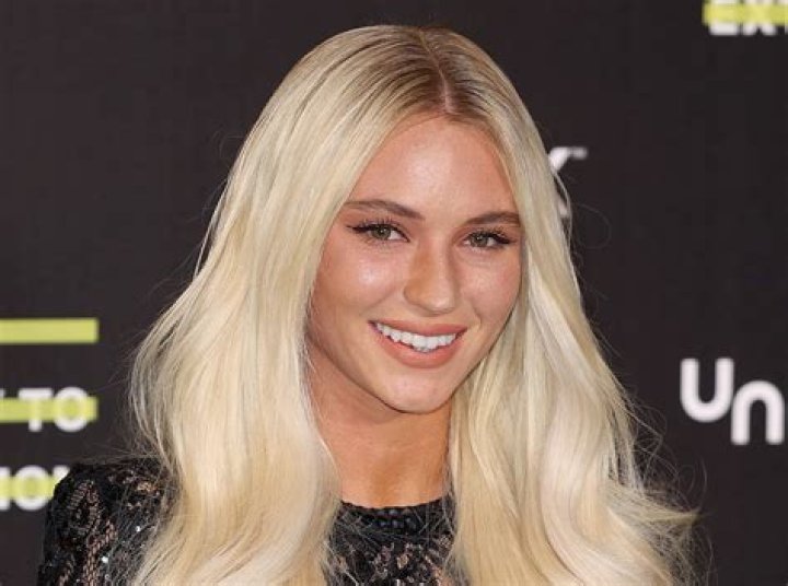 Lucie Donlan in Bathing Suit "Becomes the Fire" — Celebwell