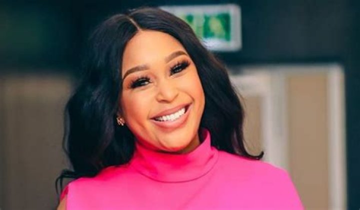 South African Model Minnie Dlamini Shares Swimsuit Photo By the Pool